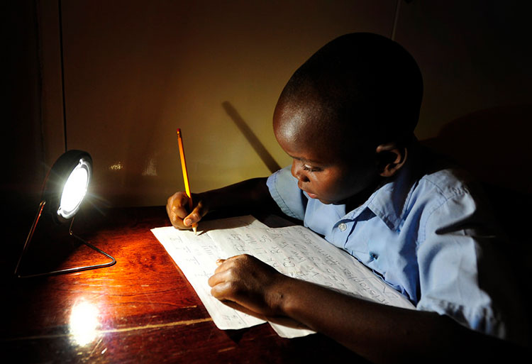 Boy using solar light