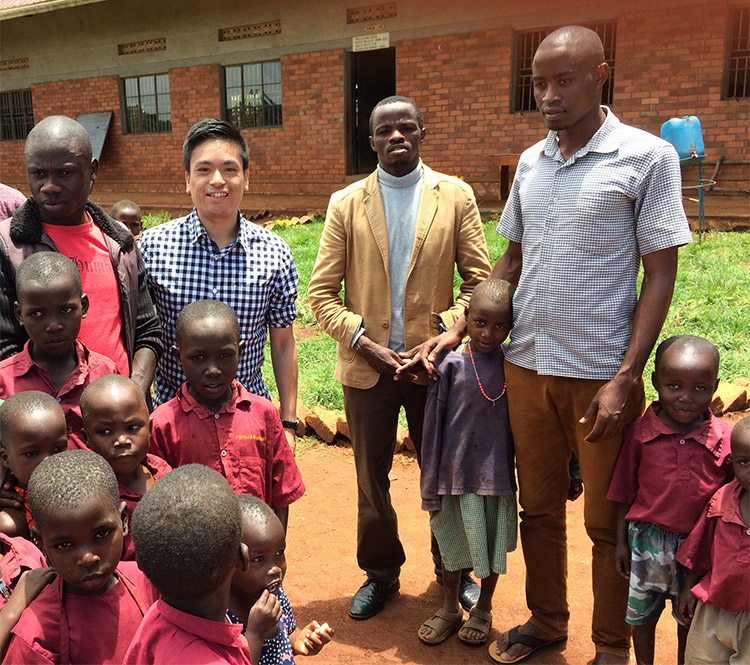 Ramon and Sadick pictured with other teachers and students